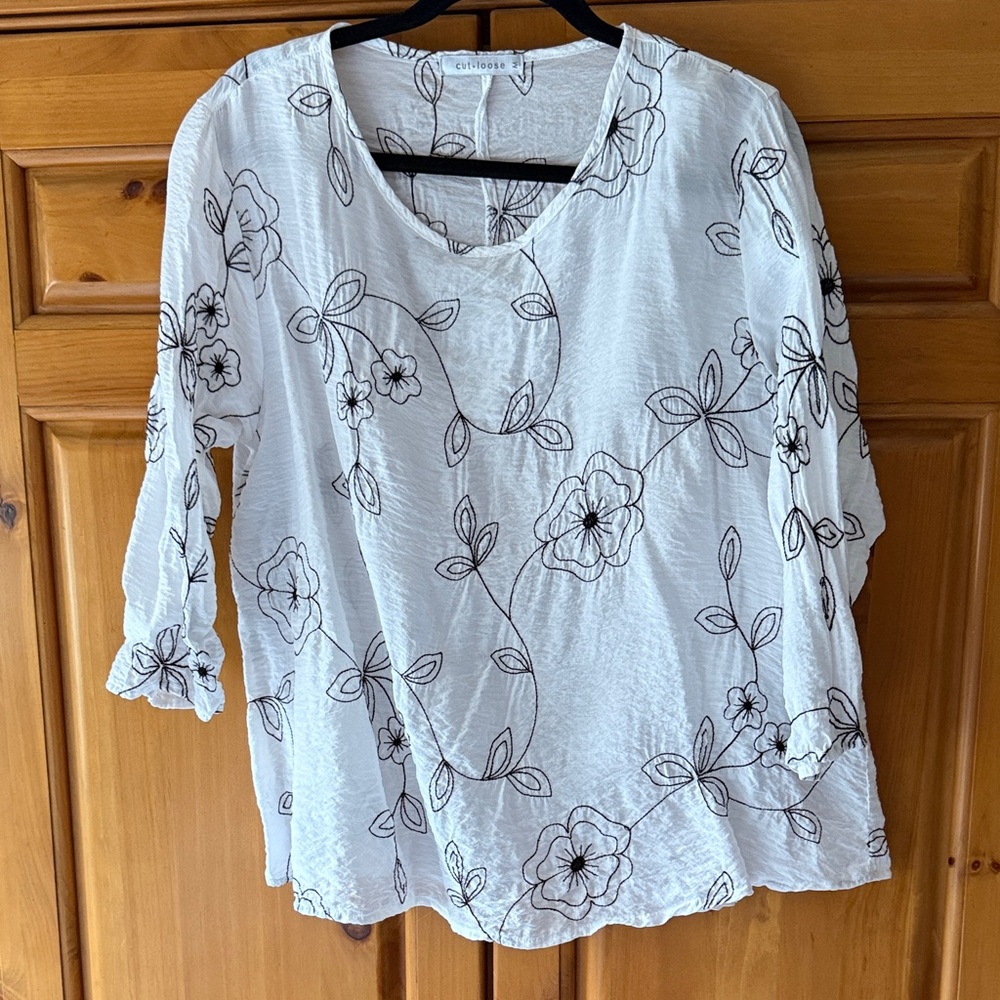 Cut Loose White Blouse with Black Floral Design